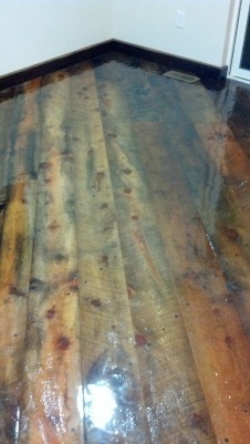 Epoxy.com Product #15 Clear Epoxy Top Coating over rough cut reclaimed barn board floor.